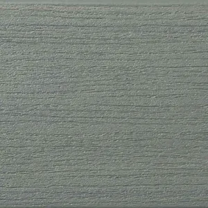 Light gray-green composite decking color sample with wood-grain texture