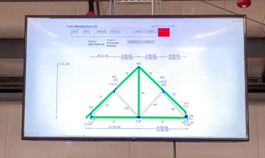 Wall monitor showing a roof truss design diagram for a Crescent Homes job
